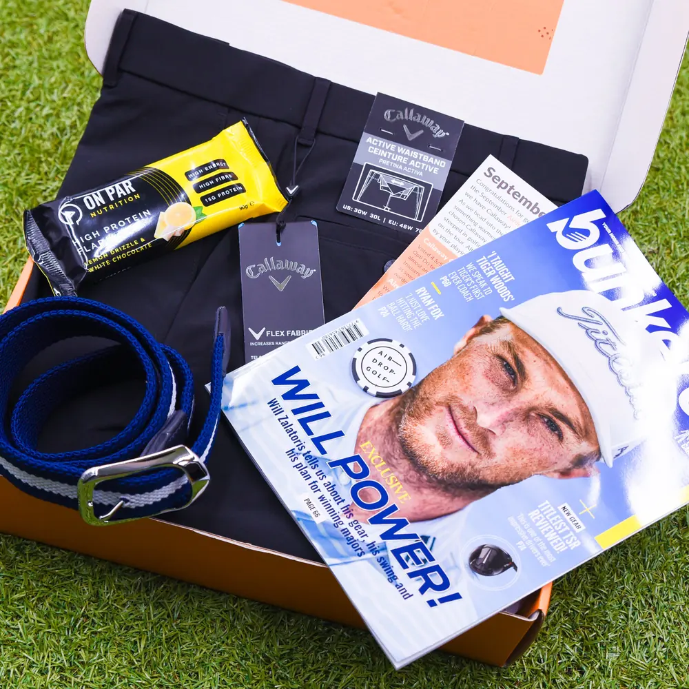 Mens Mystery Box with a selection of golf apparel and accessories