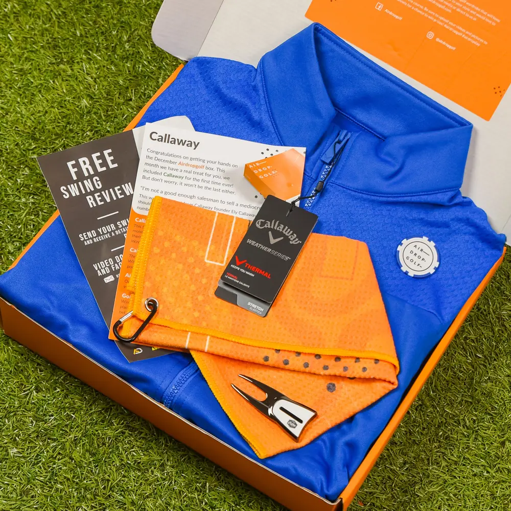 Mens Premium Mystery Box with a selection of golf apparel and accessories